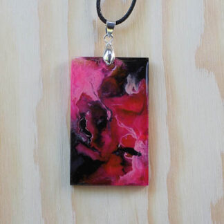 Pink and black resin pendant